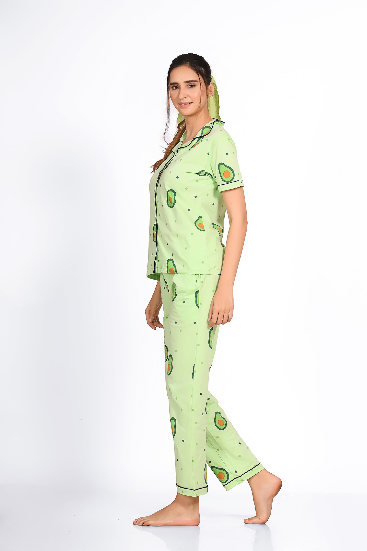 Side view of woman wearing light green colour avocado print night suit/ pyjama set - Napstory