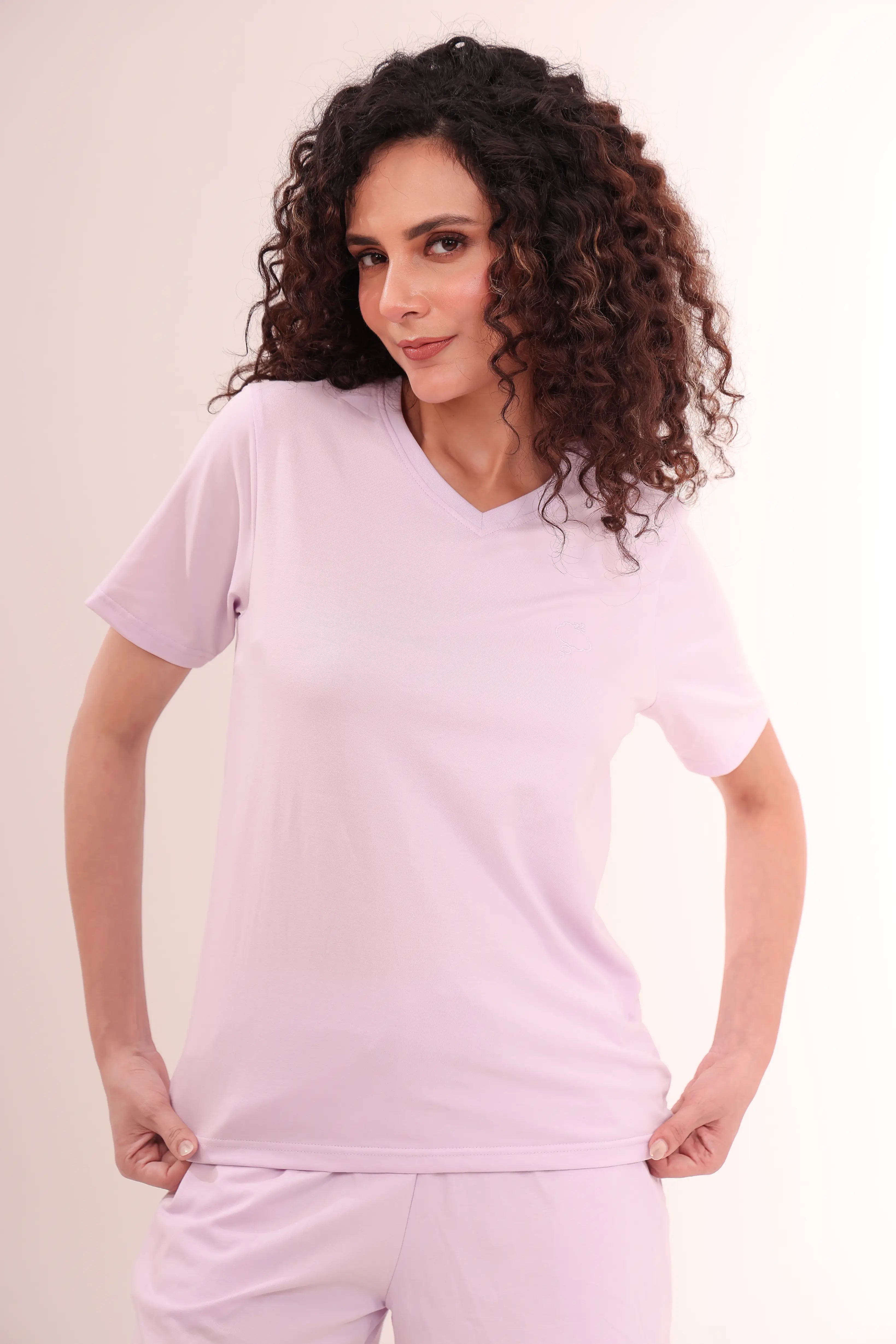 Woman in Lavender V-Neck Tee crafted from breathable 100% cotton nightwear and loungewear by NapStory