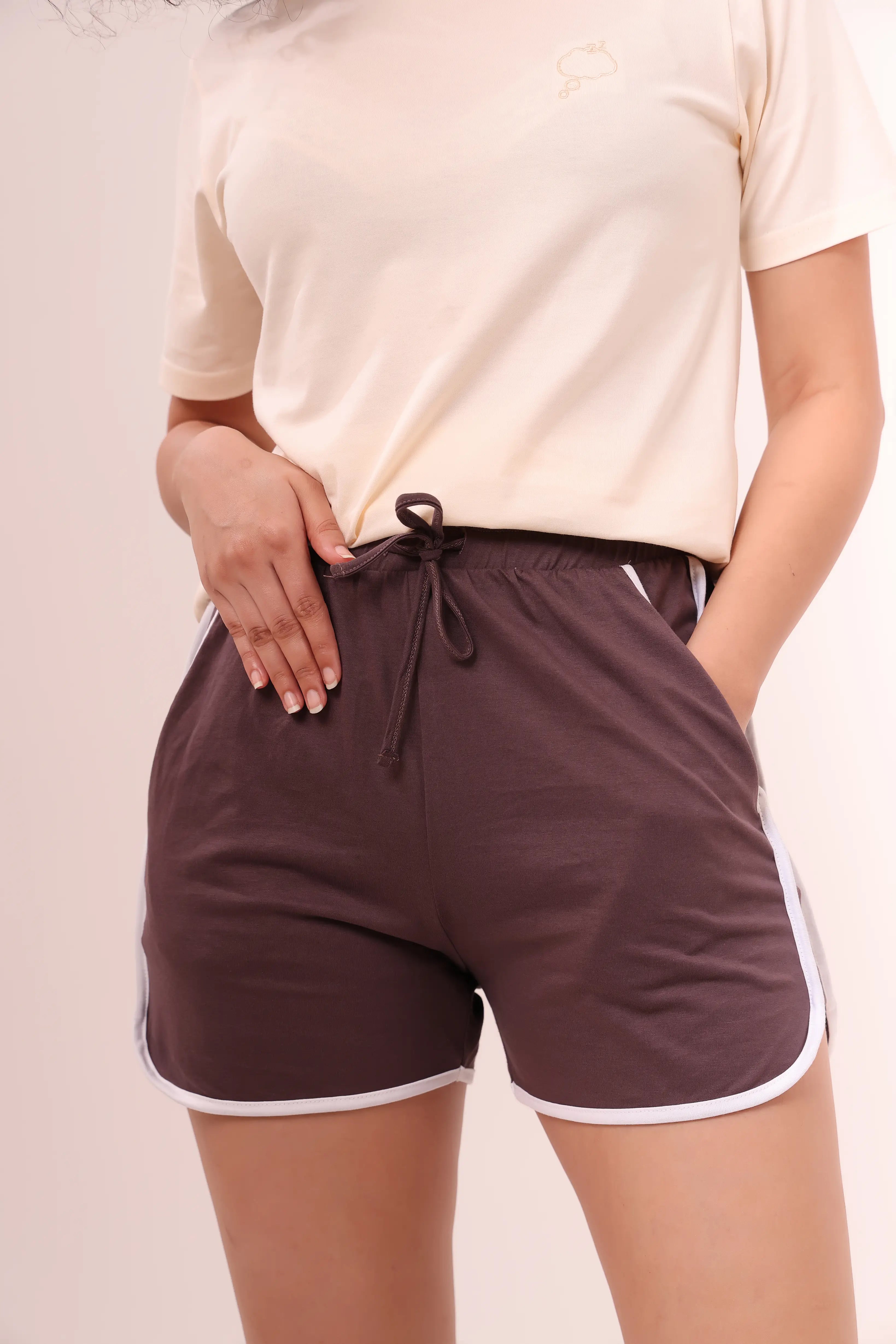 Brown piped-up cotton shorts with pocket detail and contrast piping by NapStory