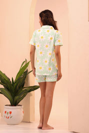 Back view of woman in Spring Fizz Shorts Set night suit by NapStory.