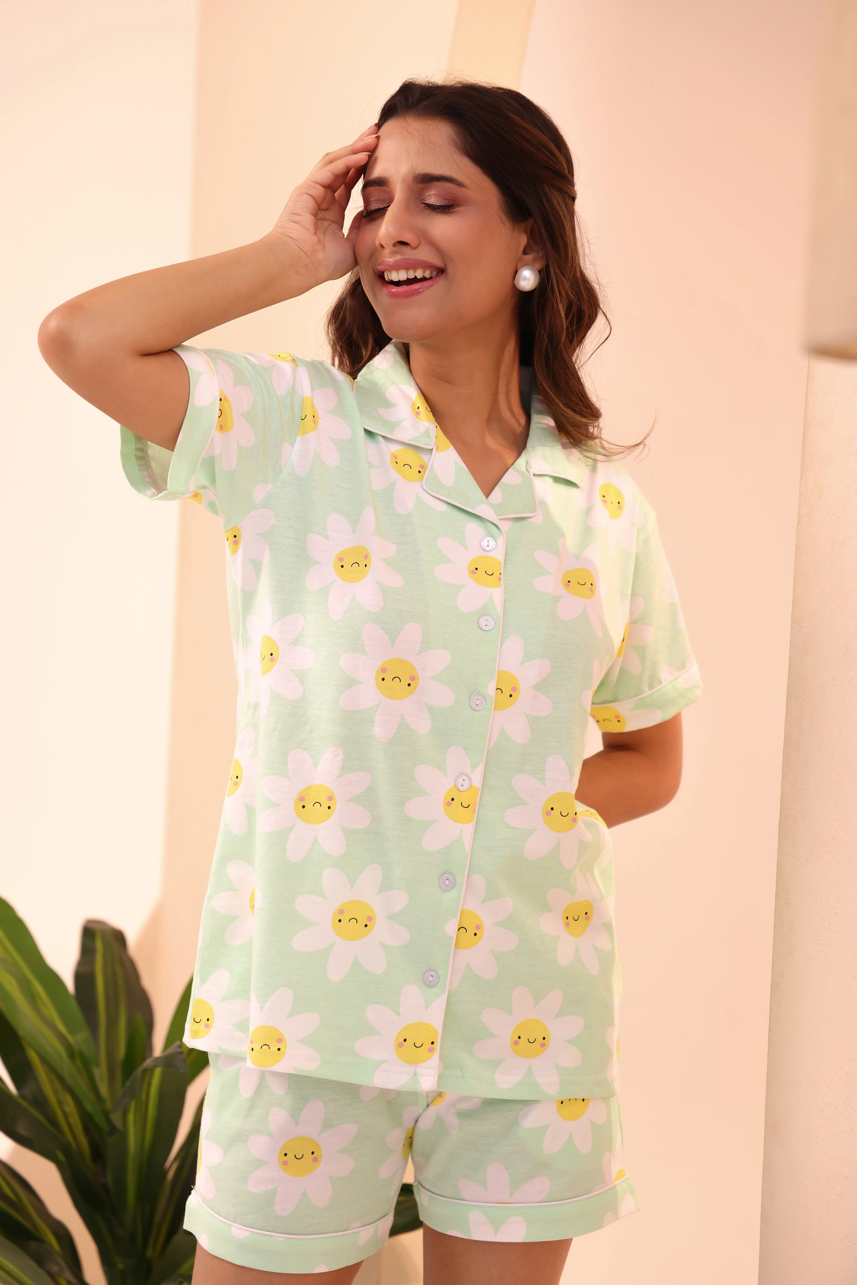 Woman smiling in Spring Fizz Shorts Set night suit by NapStory.