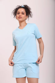 Woman wearing Basic Sky Blue V-Neck Tee crafted from breathable 100% cotton loungewear by NapStory