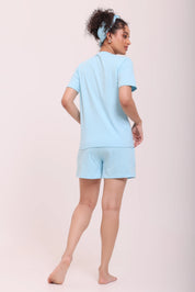 Back view of woman wearing Basic Sky Blue V-Neck Tee crafted from breathable cotton by NapStory